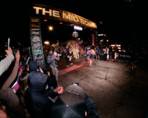 The final finisher is celebrated by being sprayed with champagne as she finishes at the 2026 MidSouth DFL party.